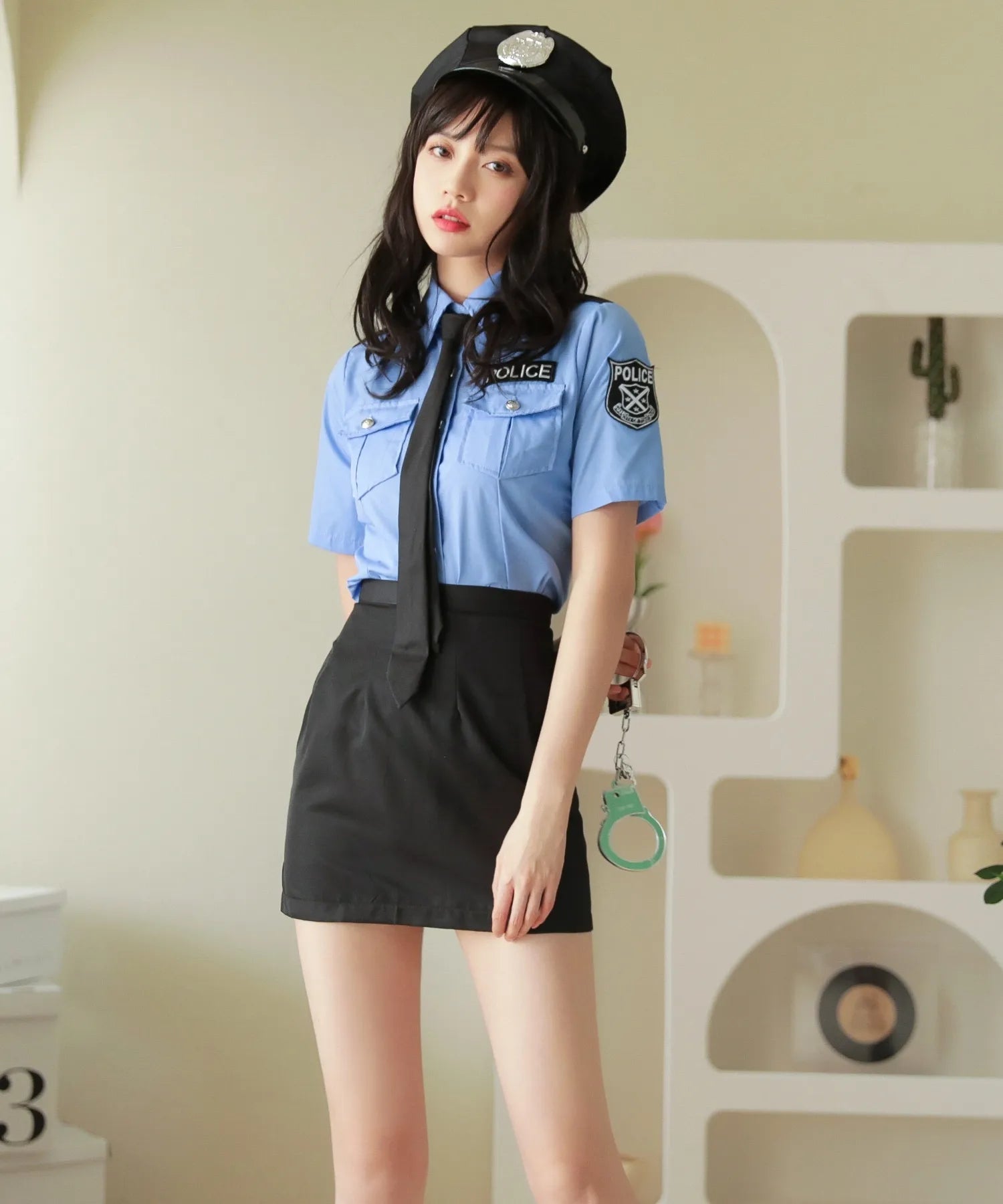 Saxe-colored police in trapezoidal mini skirt
