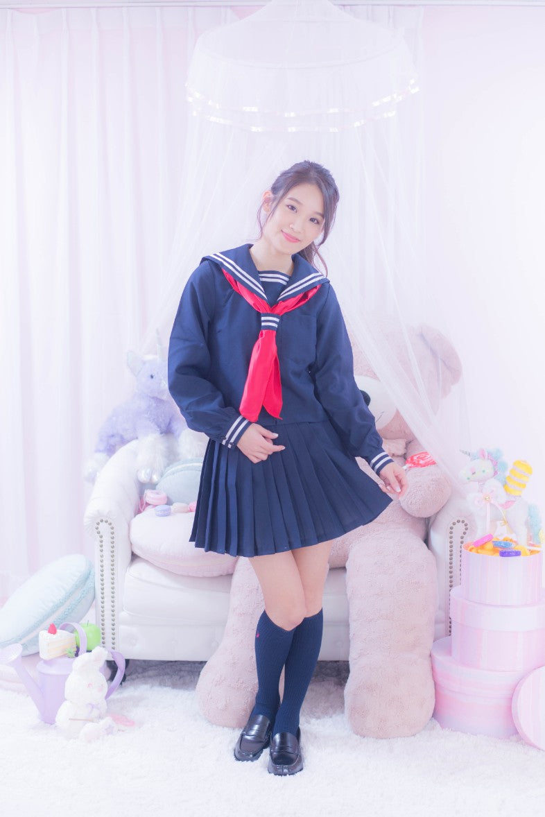 Navy blue sailor suit with long sleeves and red scarf