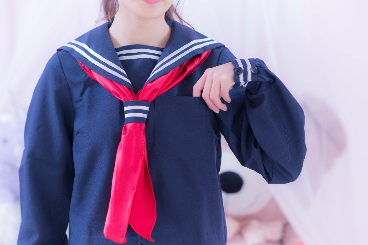 Navy blue sailor suit with long sleeves and red scarf