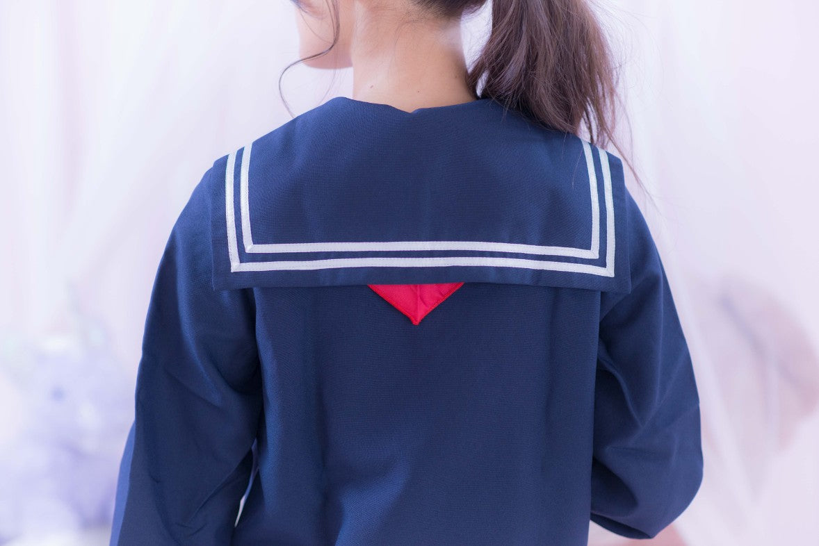 Navy blue sailor suit with long sleeves and red scarf